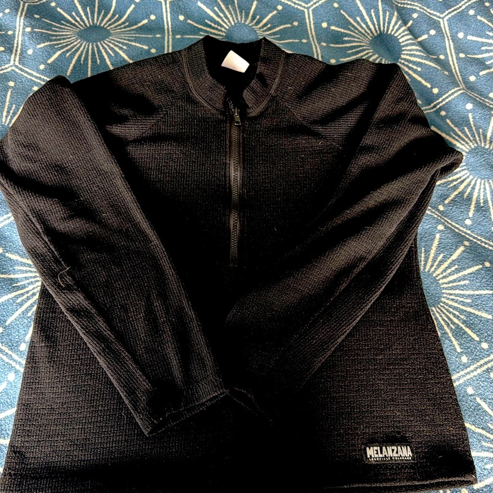 Quarter zip melanzana size small black. Great condition.